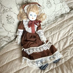 Doll - porcelain face and hands